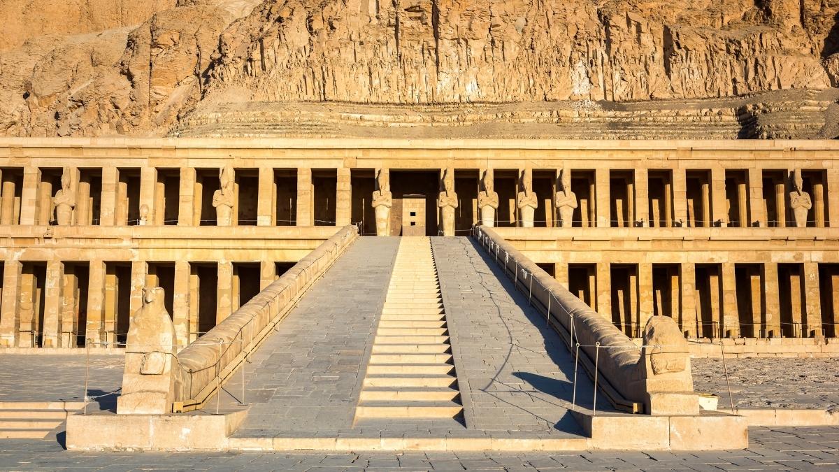 Hatshepsut Temple is a three-tiered mortuary temple with limestone cliffs, celebrating one of Egypt’s most successful female rulers.